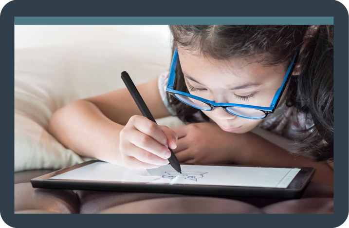 Image of a young girl using a Connect 12 tablet and pencil.