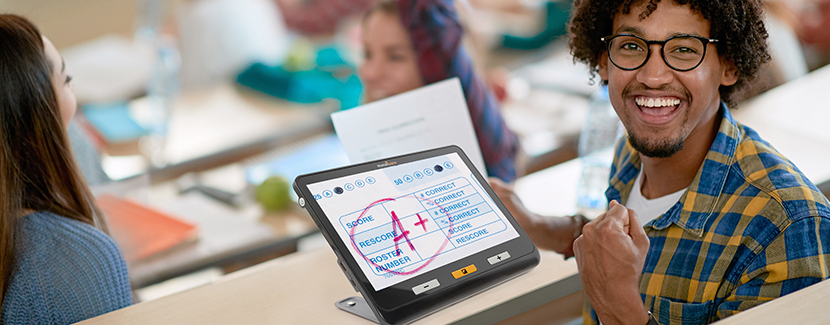 A smiling teenager magnifying his A+ test result using Explorer 12.