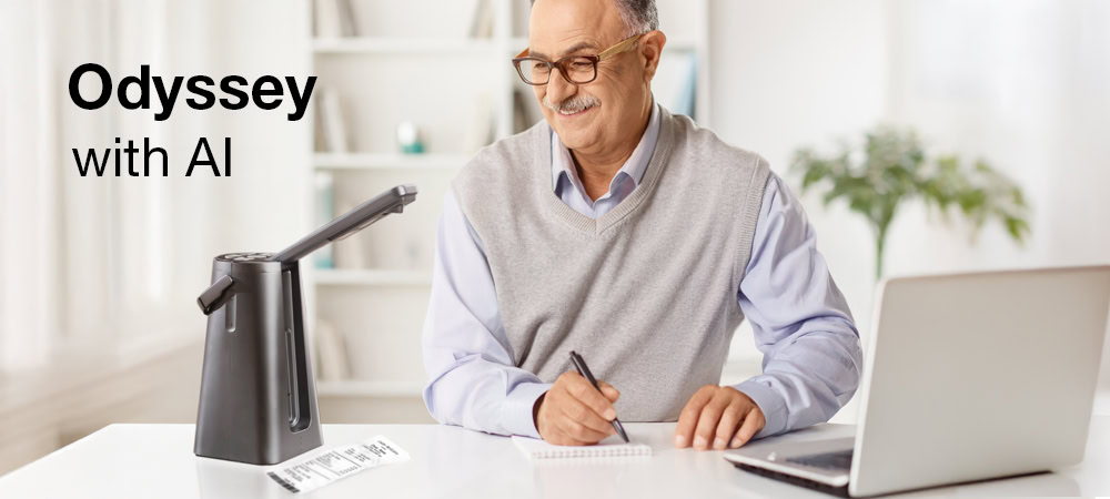 Image of a smiling, mature man taking notes in front of a laptop, the Odyssey captures the text on an invoice.