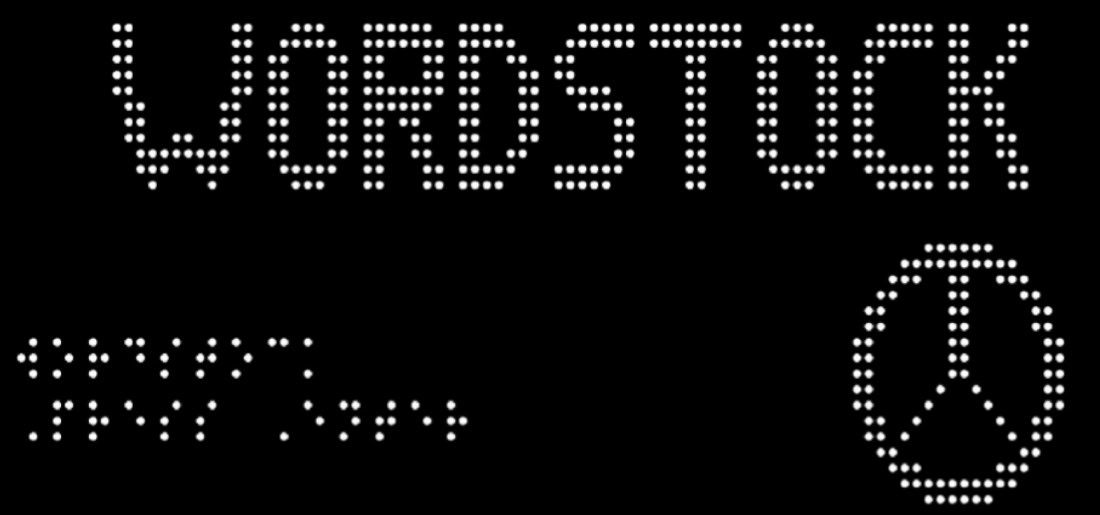 Reading the word “Wordstock” in braille on the Monarch tactile dynamic display.